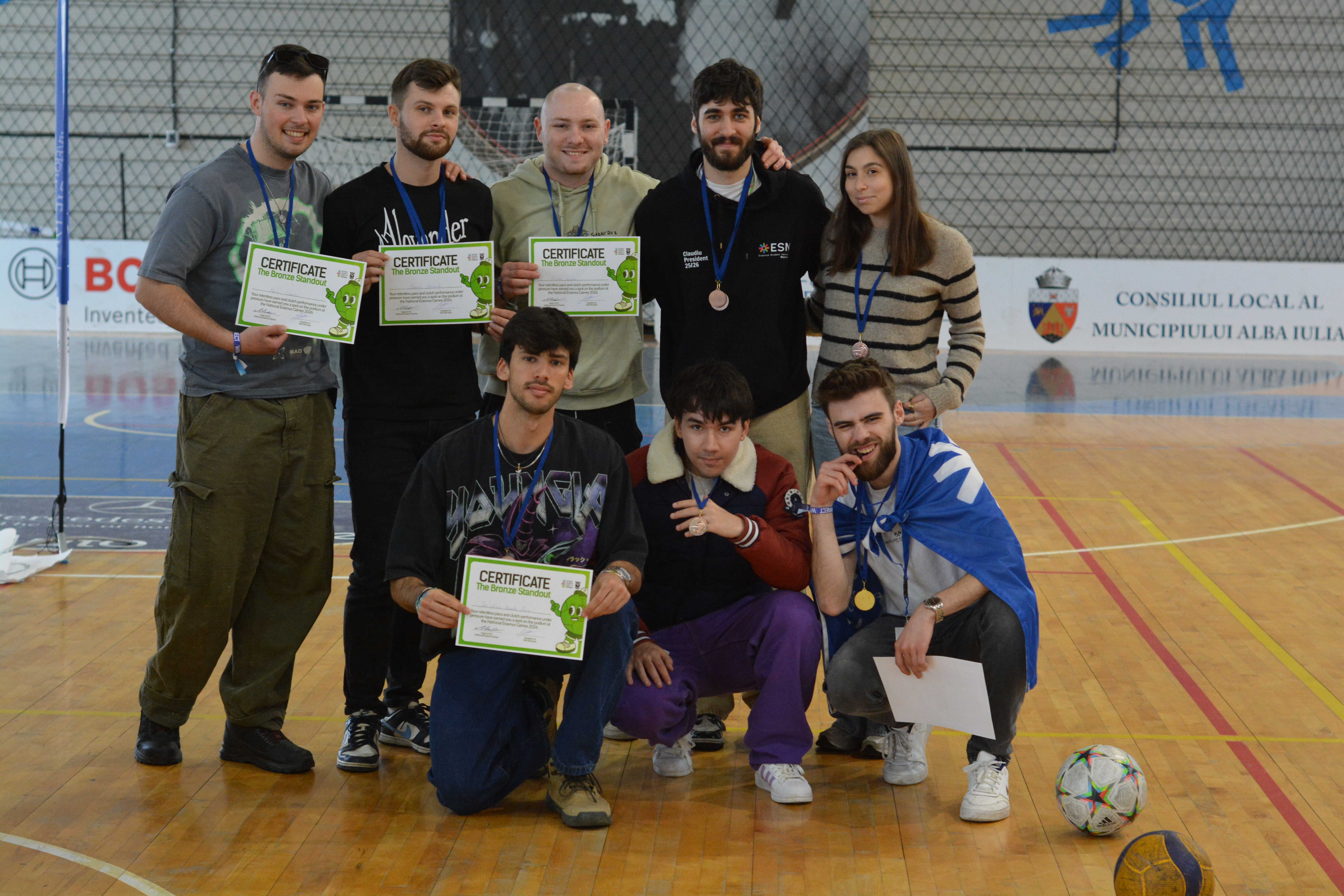 Award photo with certificates and medals