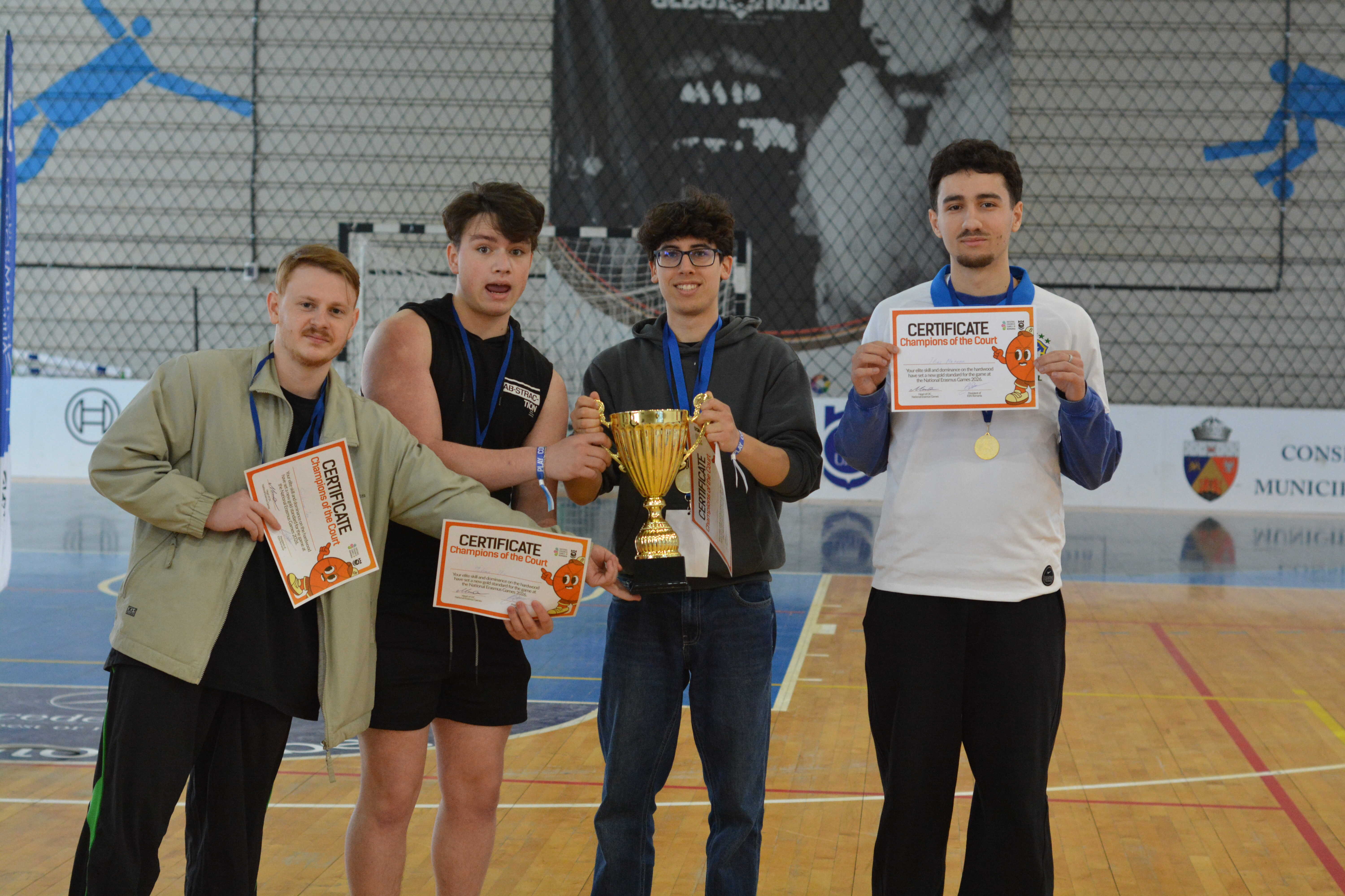 Award winners with trophy and certificates
